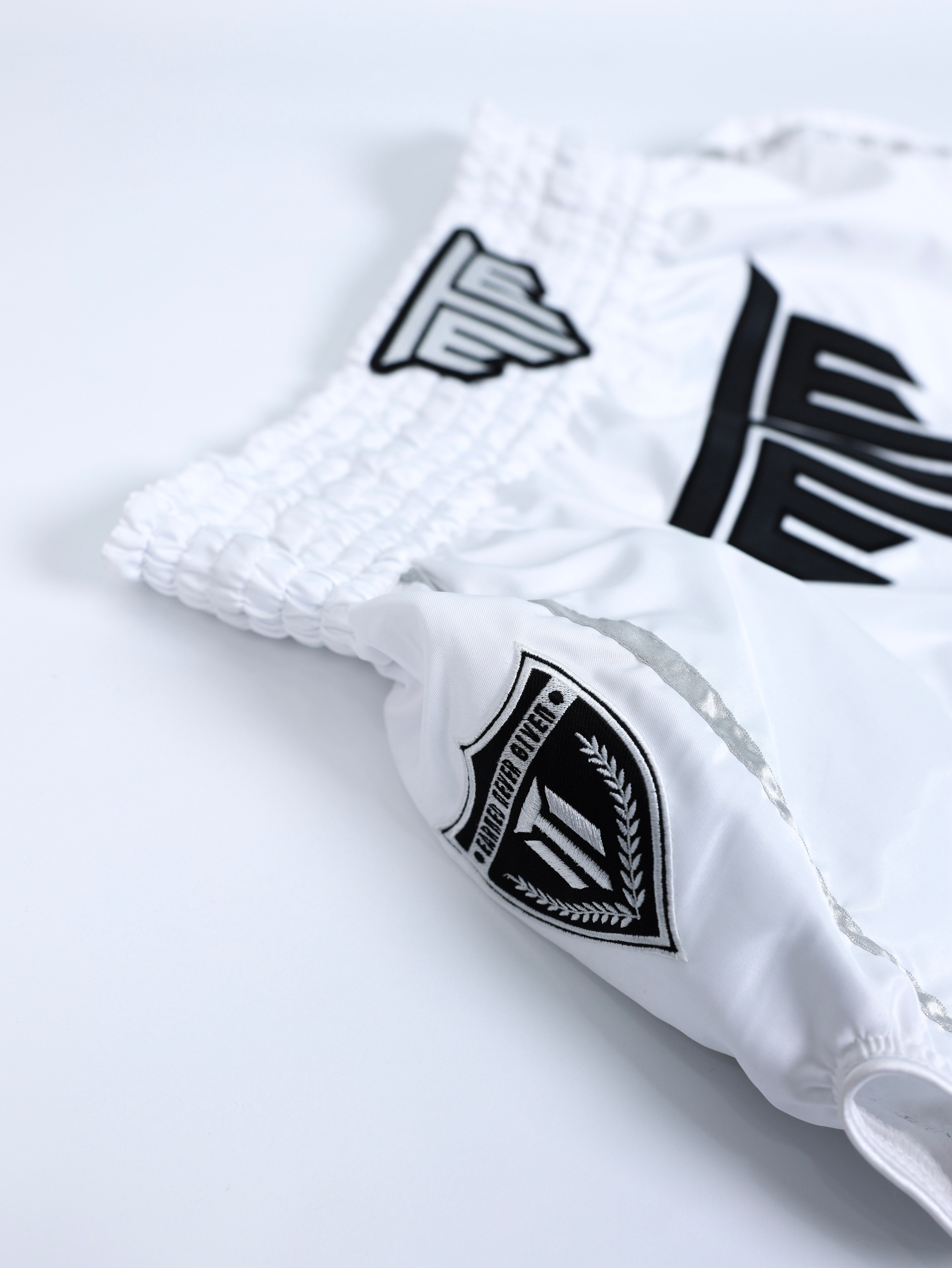 "ESSENTIALS" MUAY THAI SHORTS - WHITE